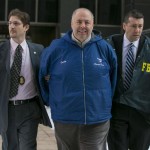 Bonanno family associate Charles Centaro   is escorted by FBI agents from their Manhattan offices in New York